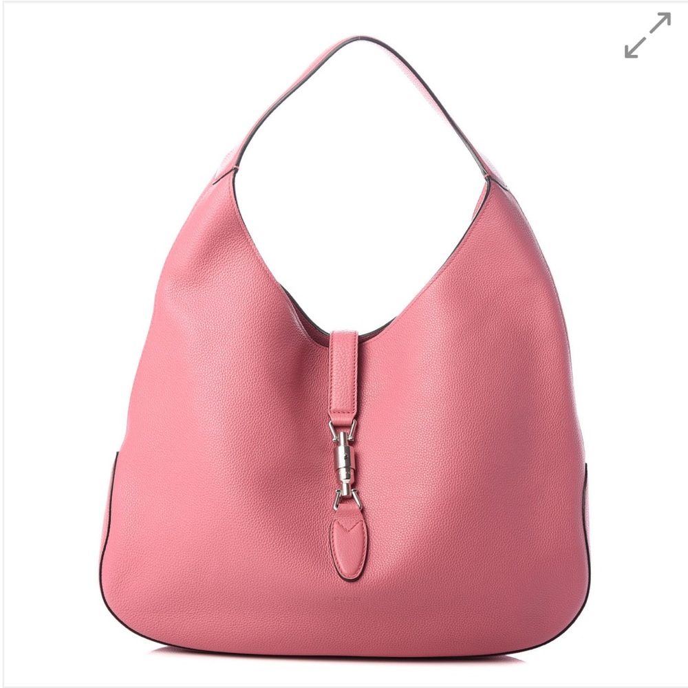 An guaranteed authentic GUCCI Grained Calfskin Large Soft Jackie Hobo in Pink.